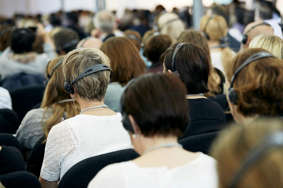 Event participants sitting and listening to a lecture